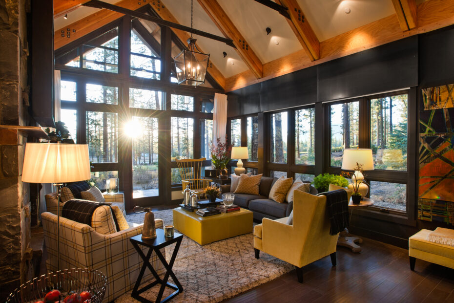 RUstic Living Room With Exposing Beams Warm Sofas Thick Rug Cool Chandelier And Big Windows 1